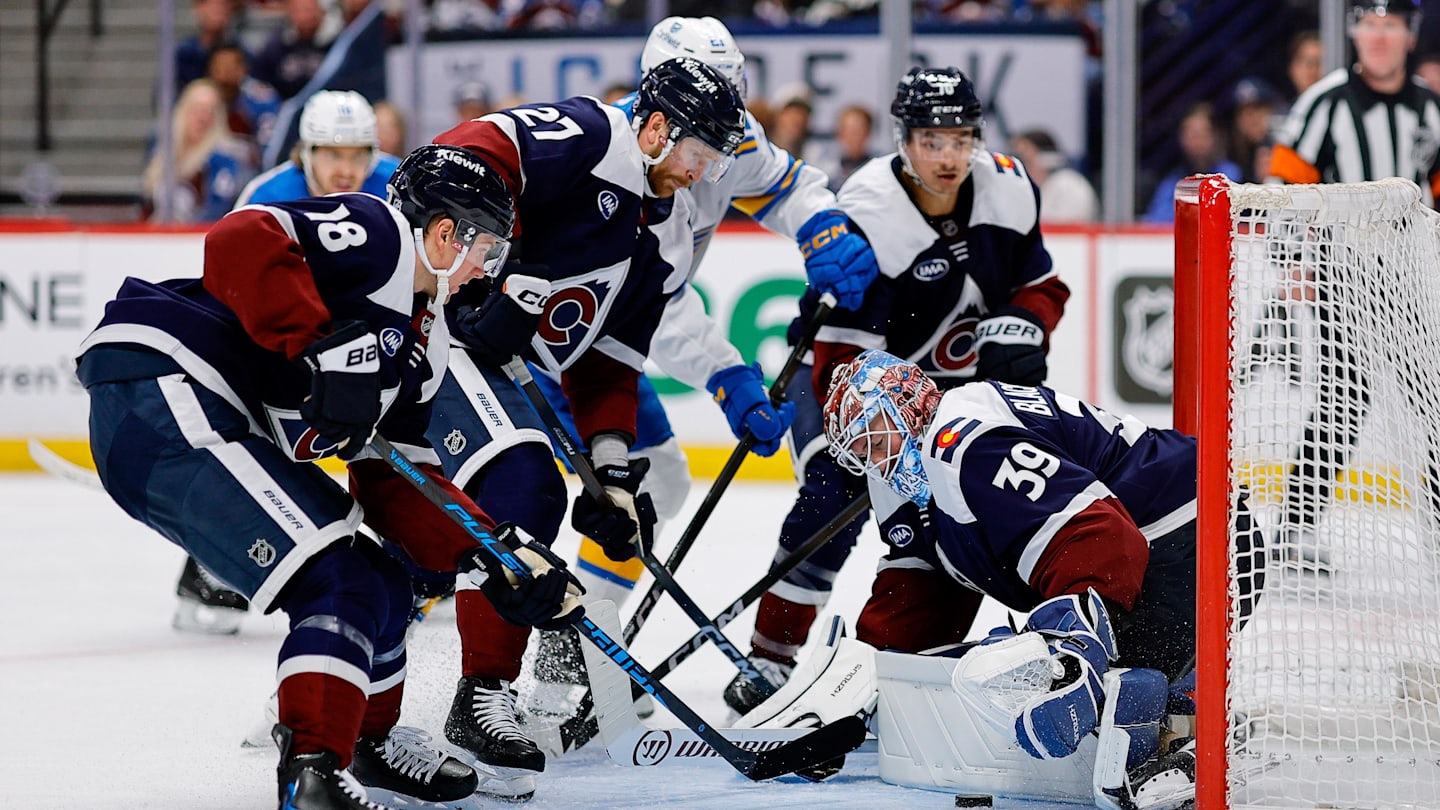 Apr 5, 2026; Denver, Colorado, USA; Colorado Avalanche goaltender MacKenzie Blackwood (39) covers the puck as center Jack Drury (18) and defenseman Brett Kulak (27) and defenseman Sam Malinski (70) defend in the third period against the St. Louis Blues at Ball Arena. Mandatory Credit: Isaiah J. Downing-Imagn Images