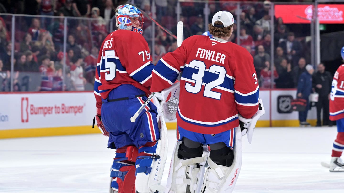 Mar 26, 2026; Montreal, Quebec, CAN; Montreal Canadiens goalie Jakub Dobes (75) celebrates the win against the Columbus Blue Jackets with teammate goalie Jacob Fowler (32) at the Bell Centre. Mandatory Credit: Eric Bolte-Imagn Images