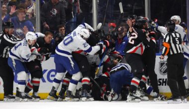 Apr 6, 2026; Buffalo, New York, USA;  The Buffalo Sabres and the Tampa Bay Lightning get in to a scrum after the whistle during the first period at KeyBank Center. Mandatory Credit: Timothy T. Ludwig-Imagn Images