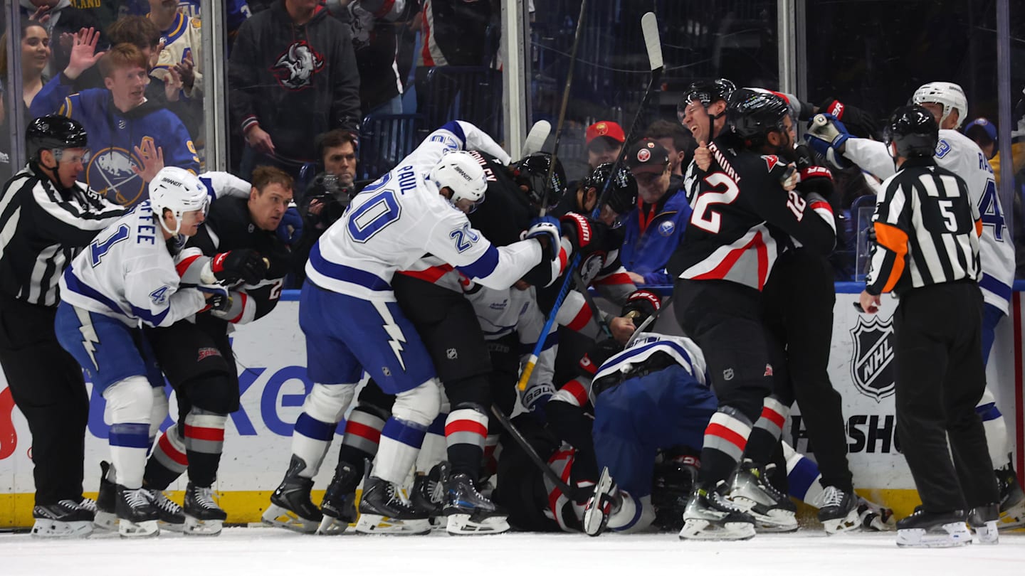 Apr 6, 2026; Buffalo, New York, USA;  The Buffalo Sabres and the Tampa Bay Lightning get in to a scrum after the whistle during the first period at KeyBank Center. Mandatory Credit: Timothy T. Ludwig-Imagn Images