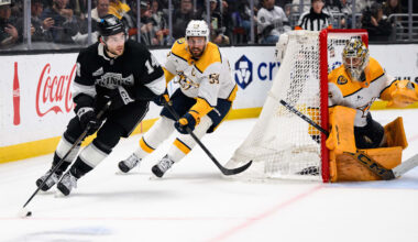 Apr 6, 2026; Los Angeles, California, USA; Los Angeles Kings right wing Alex Laferriere (14) controls the puck while under pressure from Nashville Predators defenseman Roman Josi (59) during overtime at Crypto.com Arena. Mandatory Credit: William Liang-Imagn Images