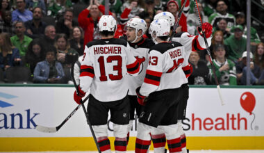 Mar 24, 2026; Dallas, Texas, USA; New Jersey Devils center Nico Hischier (13) and defenseman Luke Hughes (43) and right wing Timo Meier (28) celebrates a goal scored by Meier against the Dallas Stars during the third period at the American Airlines Center. Mandatory Credit: Jerome Miron-Imagn Images