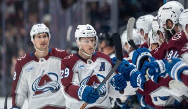 Mar 12, 2026; Seattle, Washington, USA; Colorado Avalanche forward Nathan MacKinnon (29) celebrates a goal with teammates on the bench during the first period against the Seattle Kraken at Climate Pledge Arena. Mandatory Credit: Stephen Brashear-Imagn Images