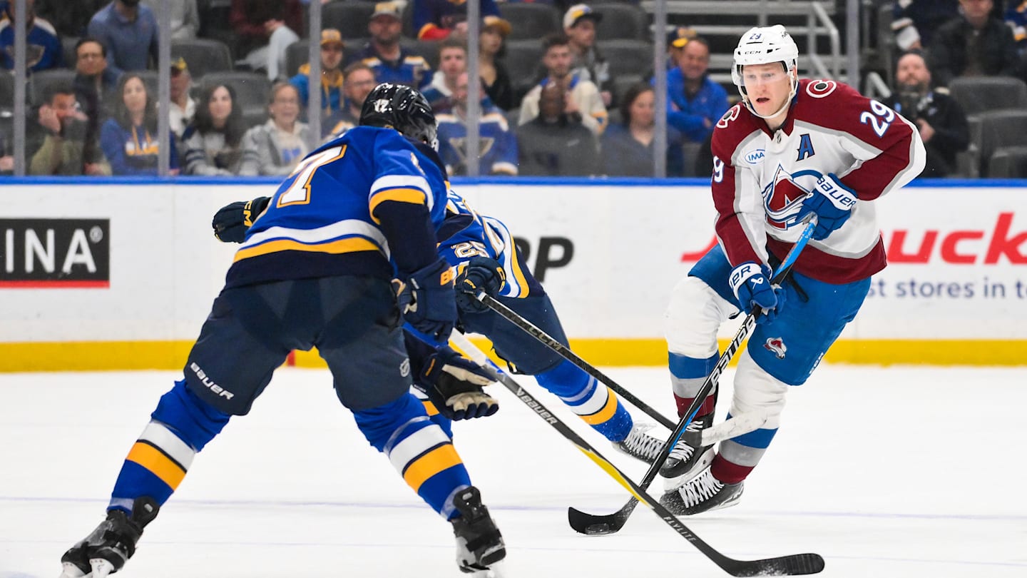 Apr 7, 2026; St. Louis, Missouri, USA; Colorado Avalanche center Nathan MacKinnon (29) controls the puck against the St. Louis Blues during the third period at Enterprise Center. Mandatory Credit: Jeff Curry-Imagn Images