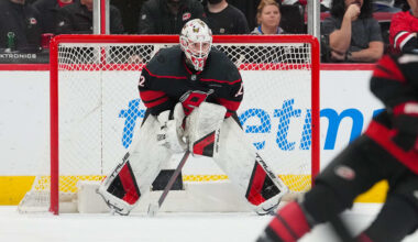 Mar 28, 2026; Raleigh, North Carolina, USA;  Carolina Hurricanes goaltender Brandon Bussi (32) looks on against the New Jersey Devils at Lenovo Center. Mandatory Credit: James Guillory-Imagn Images