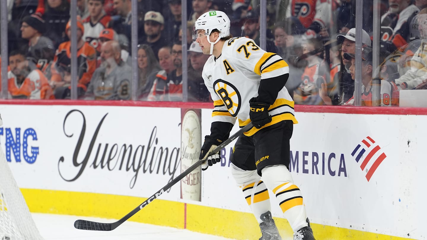 Apr 5, 2026; Philadelphia, Pennsylvania, USA; Boston Bruins defenseman Charlie McAvoy (73) controls the puck against the Philadelphia Flyers in the first period at Xfinity Mobile Arena. Mandatory Credit: Kyle Ross-Imagn Images