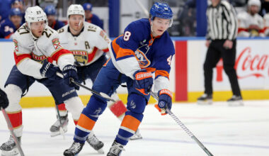 Mar 28, 2026; Elmont, New York, USA; New York Islanders defenseman Matthew Schaefer (48) plays the puck against Florida Panthers center Eetu Luostarinen (27) and left wing Matthew Tkachuk (19) during the second period at UBS Arena. Mandatory Credit: Brad Penner-Imagn Images