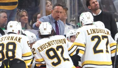 Mar 8, 2026; Pittsburgh, Pennsylvania, USA;  Boston Bruins head coach Marco Sturm (middle) talks to his team against the Pittsburgh Penguins during the third period at PPG Paints Arena. Mandatory Credit: Charles LeClaire-Imagn Images