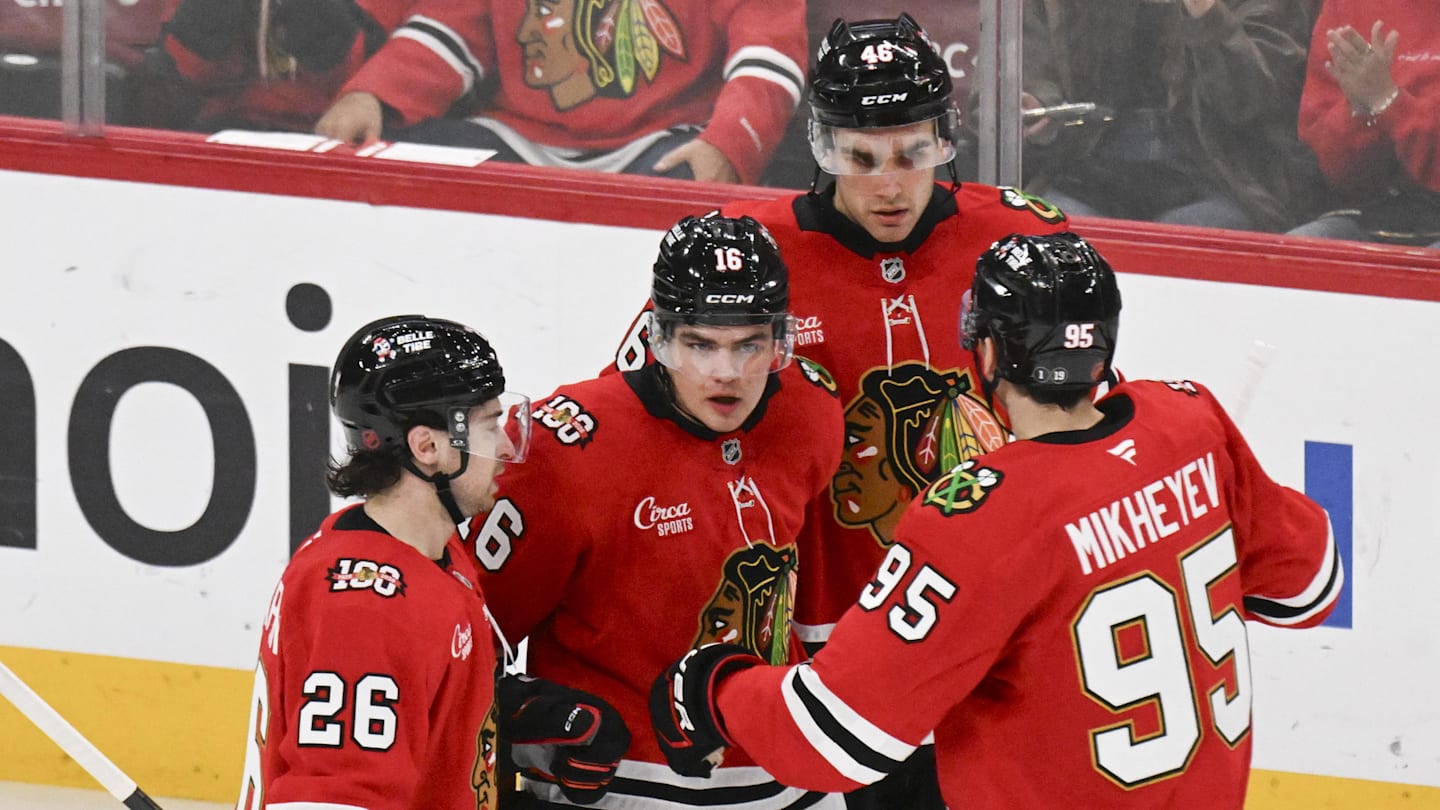 Apr 9, 2026; Chicago, Illinois, USA;  Chicago Blackhawks center Anton Frondell (16) celebrates his goal against the Carolina Hurricanes with teammates  during the third period at the United Center. Mandatory Credit: Matt Marton-Imagn Images