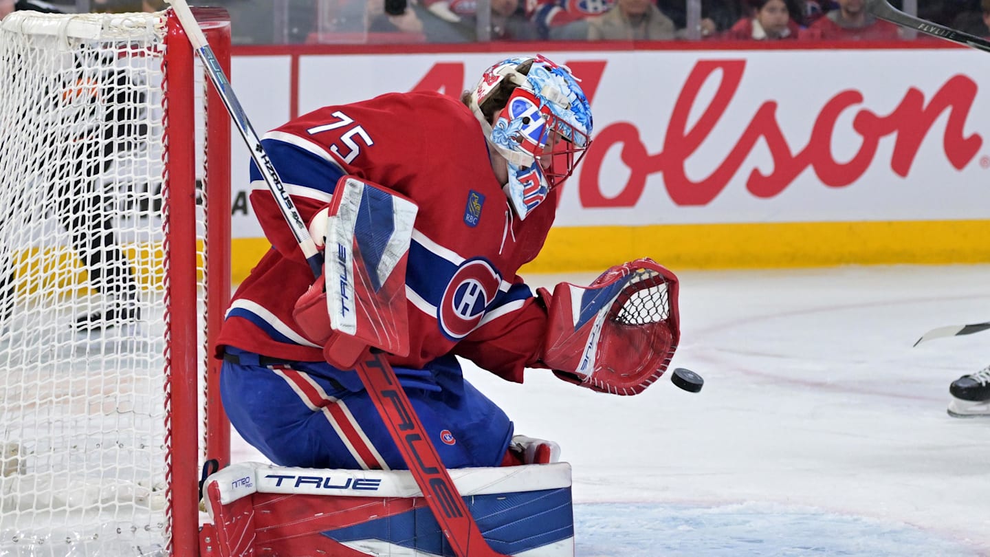Apr 7, 2026; Montreal, Quebec, CAN; Montreal Canadiens goalie Jakub Dobes (75) makes a save during the first period of the game against the Florida Panthers at the Bell Centre. Mandatory Credit: Eric Bolte-Imagn Images