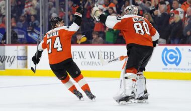 Apr 5, 2026; Philadelphia, Pennsylvania, USA; Philadelphia Flyers right wing Owen Tippett (74) celebrates with goalie Dan Vladar (80) after the game against the Boston Bruins at Xfinity Mobile Arena.