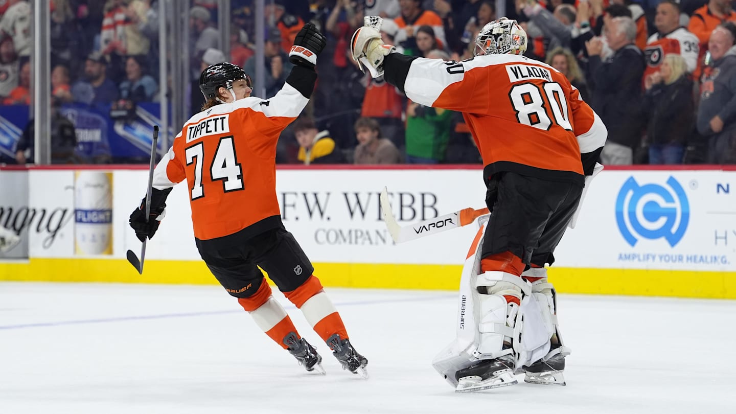Apr 5, 2026; Philadelphia, Pennsylvania, USA; Philadelphia Flyers right wing Owen Tippett (74) celebrates with goalie Dan Vladar (80) after the game against the Boston Bruins at Xfinity Mobile Arena.