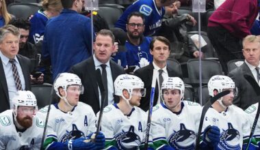 Jan 10, 2026; Toronto, Ontario, CAN; Vancouver Canucks head coach Adam Foote watches the action against the Toronto Maple Leafs during the third period at Scotiabank Arena. Mandatory Credit: Nick Turchiaro-Imagn Images