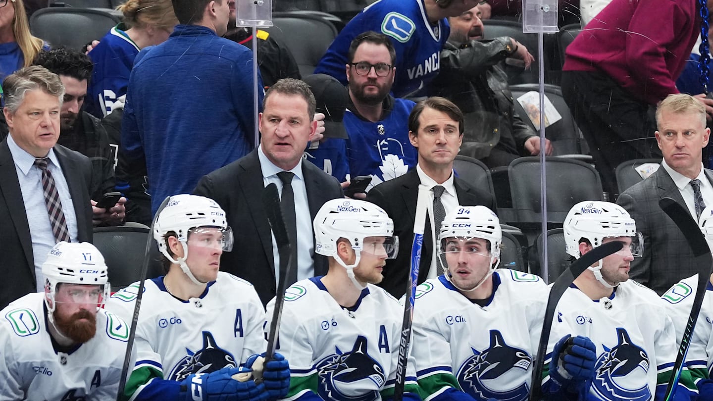 Jan 10, 2026; Toronto, Ontario, CAN; Vancouver Canucks head coach Adam Foote watches the action against the Toronto Maple Leafs during the third period at Scotiabank Arena. Mandatory Credit: Nick Turchiaro-Imagn Images