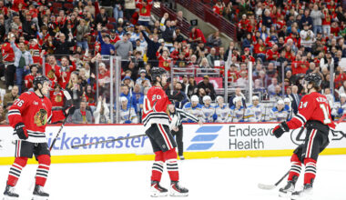 Apr 11, 2026; Chicago, Illinois, USA; Chicago Blackhawks center Ryan Greene (20) reacts after scoring against the St. Louis Blues during the first period at United Center. Mandatory Credit: Kamil Krzaczynski-Imagn Images