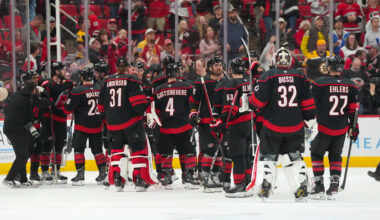 Apr 7, 2026; Raleigh, North Carolina, USA;  Carolina Hurricanes players celebrate their victory against the Boston Bruins at Lenovo Center. Mandatory Credit: James Guillory-Imagn Images