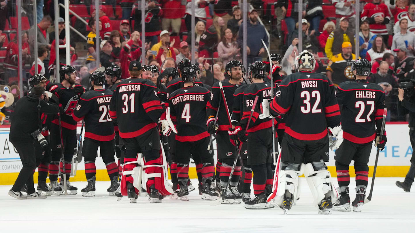 Apr 7, 2026; Raleigh, North Carolina, USA;  Carolina Hurricanes players celebrate their victory against the Boston Bruins at Lenovo Center. Mandatory Credit: James Guillory-Imagn Images