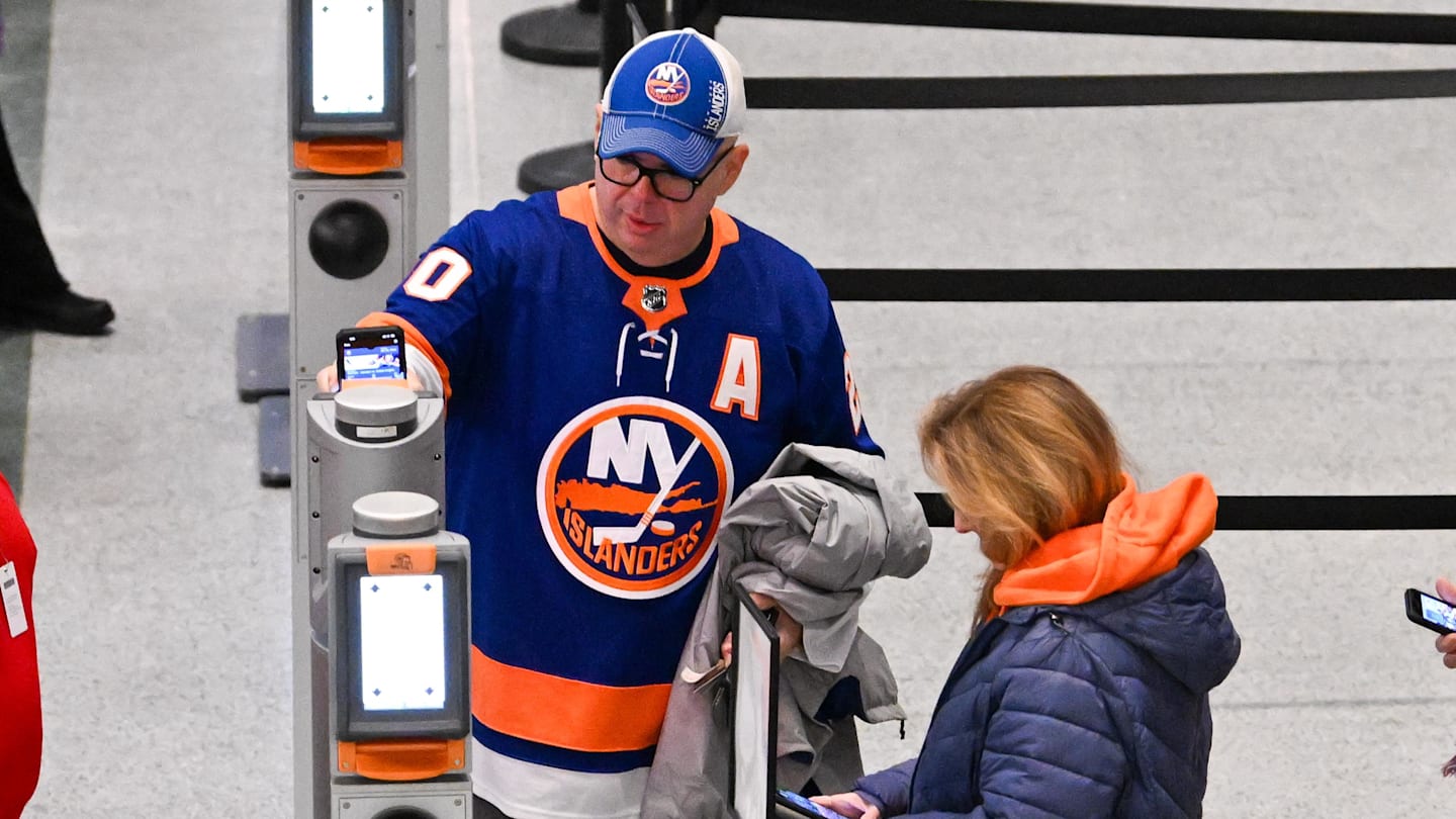 Jan 23, 2024; Elmont, New York, USA;  Fans scan tickets prior to entering the arena as the New York Islanders host the Vegas Golden Knights at UBS Arena. Mandatory Credit: Dennis Schneidler-Imagn Images