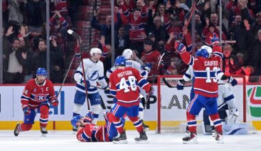 Apr 9, 2026; Montreal, Quebec, CAN; Montreal Canadiens forward Juraj Slafkovsky (20) celebrates with teammates including forward Cole Caufield (13) and forward Nick Suzuki (14) after scoring a goal against the Tampa Bay Lightning during the third period at the Bell Centre. Mandatory Credit: Eric Bolte-Imagn Images