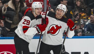 Jan 23, 2026; Vancouver, British Columbia, CAN; New Jersey Devils forward Lenni Hameenaho (29) and forward Arseny Gritsyuk (81) celebrate Hameenaho’s goal against the Vancouver Canucks in the first period at Rogers Arena. Mandatory Credit: Bob Frid-Imagn Images