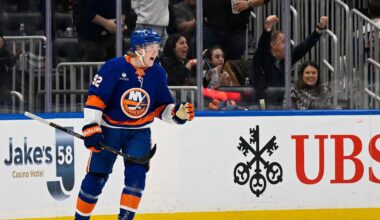 Mar 14, 2026; Elmont, New York, USA;  New York Islanders right wing Simon Holmstrom (92) celebrates his second goal against the Calgary Flames during the first period at UBS Arena. Mandatory Credit: Dennis Schneidler-Imagn Images