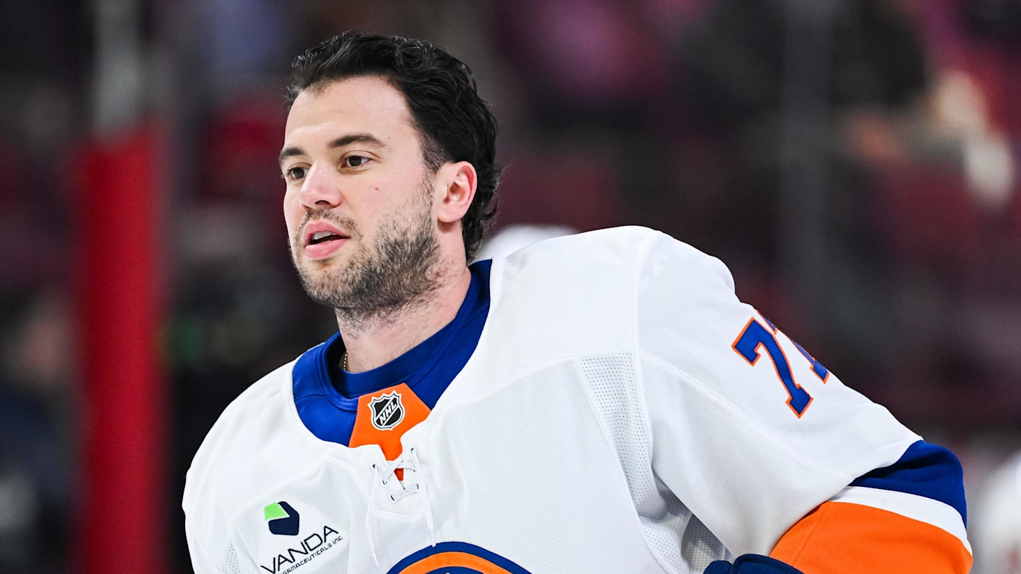 Mar 21, 2026; Montreal, Quebec, CAN; New York Islanders defenseman Tony DeAngelo (77) looks on during warm-up before the game against the Montreal Canadiens at Bell Centre. Mandatory Credit: David Kirouac-Imagn Images