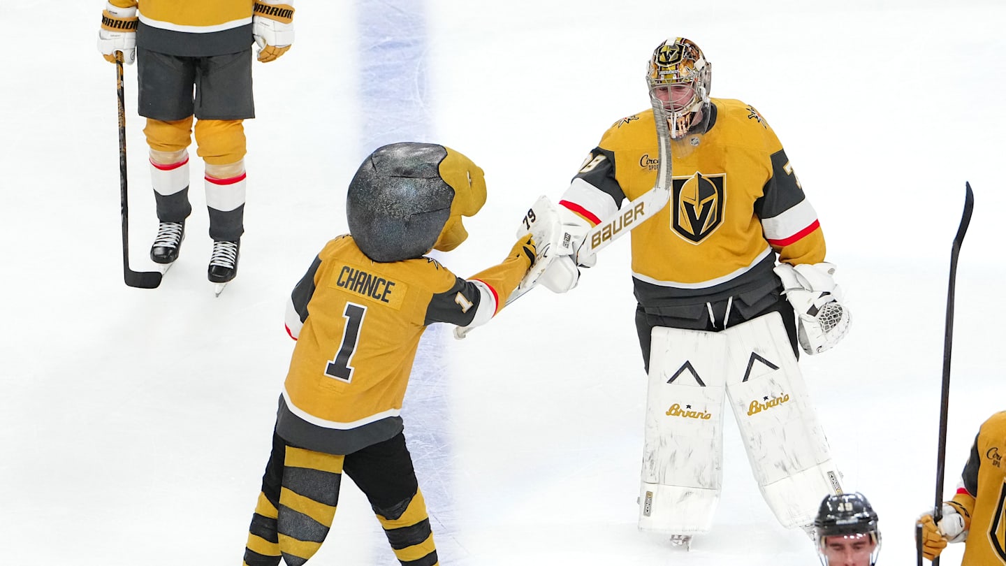 Apr 15, 2026; Las Vegas, Nevada, USA; Vegas Golden Knights goaltender Carter Hart (79) celebrates with Golden Knights mascot Chance after defeating the Seattle Kraken 4-1 at T-Mobile Arena. Mandatory Credit: Stephen R. Sylvanie-Imagn Images