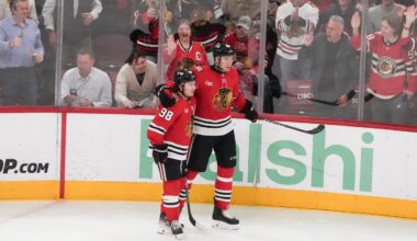 Apr 15, 2026; Chicago, Illinois, USA; Chicago Blackhawks defenseman Louis Crevier (46) celebrates his goal against the San Jose Sharks with center Connor Bedard (98)during the third period at United Center. Mandatory Credit: David Banks-Imagn Images