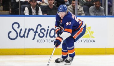 Apr 9, 2026; Elmont, New York, USA;  New York Islanders right wing Simon Holmstrom (92) plays the puck in the second period against the Toronto Maple Leafs at UBS Arena. Mandatory Credit: Wendell Cruz-Imagn Images