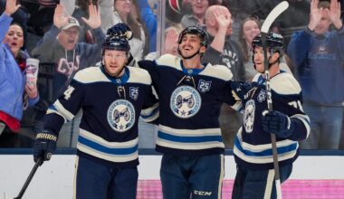 Feb 28, 2026; Columbus, Ohio, USA;  Columbus Blue Jackets left wing Mason Marchment, middle, celebrates with teammates after scoring a goal against the New York Islanders in the second period at Nationwide Arena. Mandatory Credit: Aaron Doster-Imagn Images