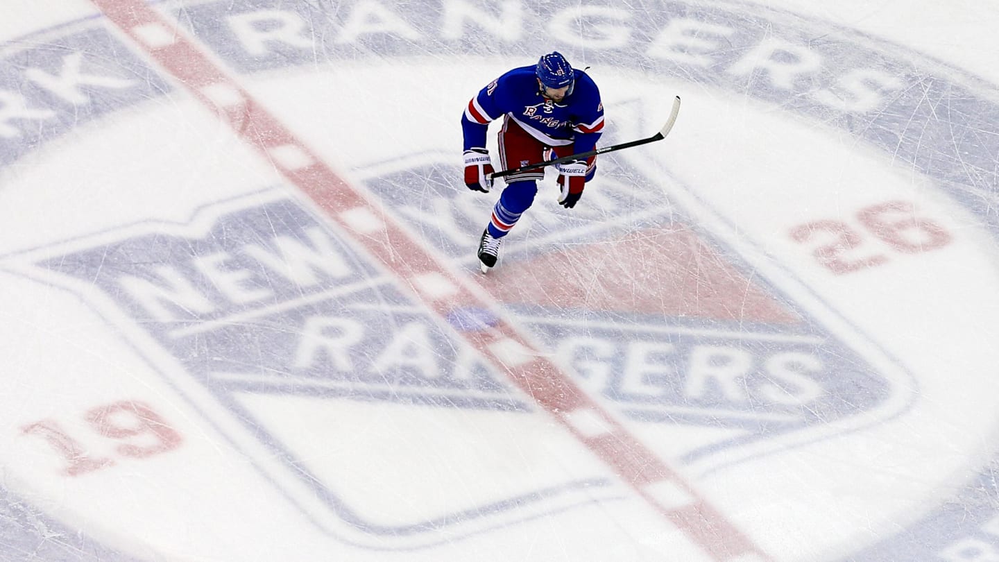 May 22, 2014; New York, NY, USA; New York Rangers left wing Rick Nash skates across the center ice logo before game three of the Eastern Conference Final of the 2014 Stanley Cup Playoffs against the Montreal Canadiens at Madison Square Garden. Mandatory Credit: Ed Mulholland-Imagn Images