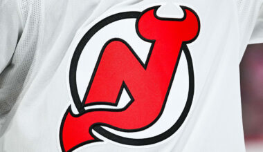 New Jersey Devils Jack Hughes is celebrating a goal vs the New York Rangers.