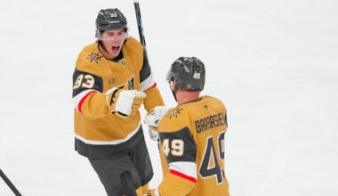 Oct 8, 2025; Las Vegas, Nevada, USA; Vegas Golden Knights right wing Mitch Marner (93) celebrates with Vegas Golden Knights left wing Ivan Barbashev (49) after assisting on a goal scored by Barbabshev against the Los Angeles Kings during the third period at T-Mobile Arena. Mandatory Credit: Stephen R. Sylvanie-Imagn Images