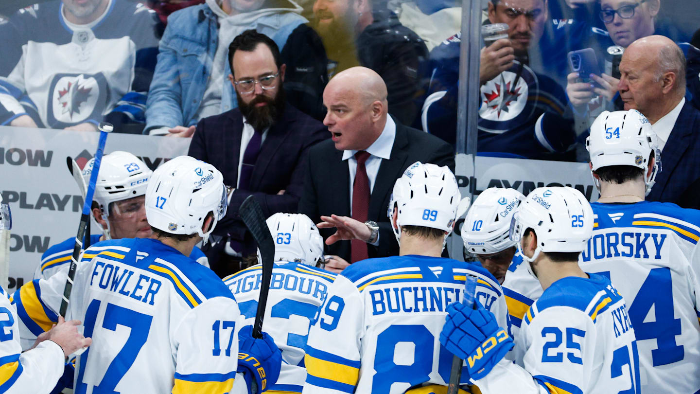 Jan 20, 2026; Winnipeg, Manitoba, CAN; St. Louis Blues coach Jim Montgomery strategizes against the Winnipeg Jets during the third period at Canada Life Centre. Mandatory Credit: Terrence Lee-Imagn Images