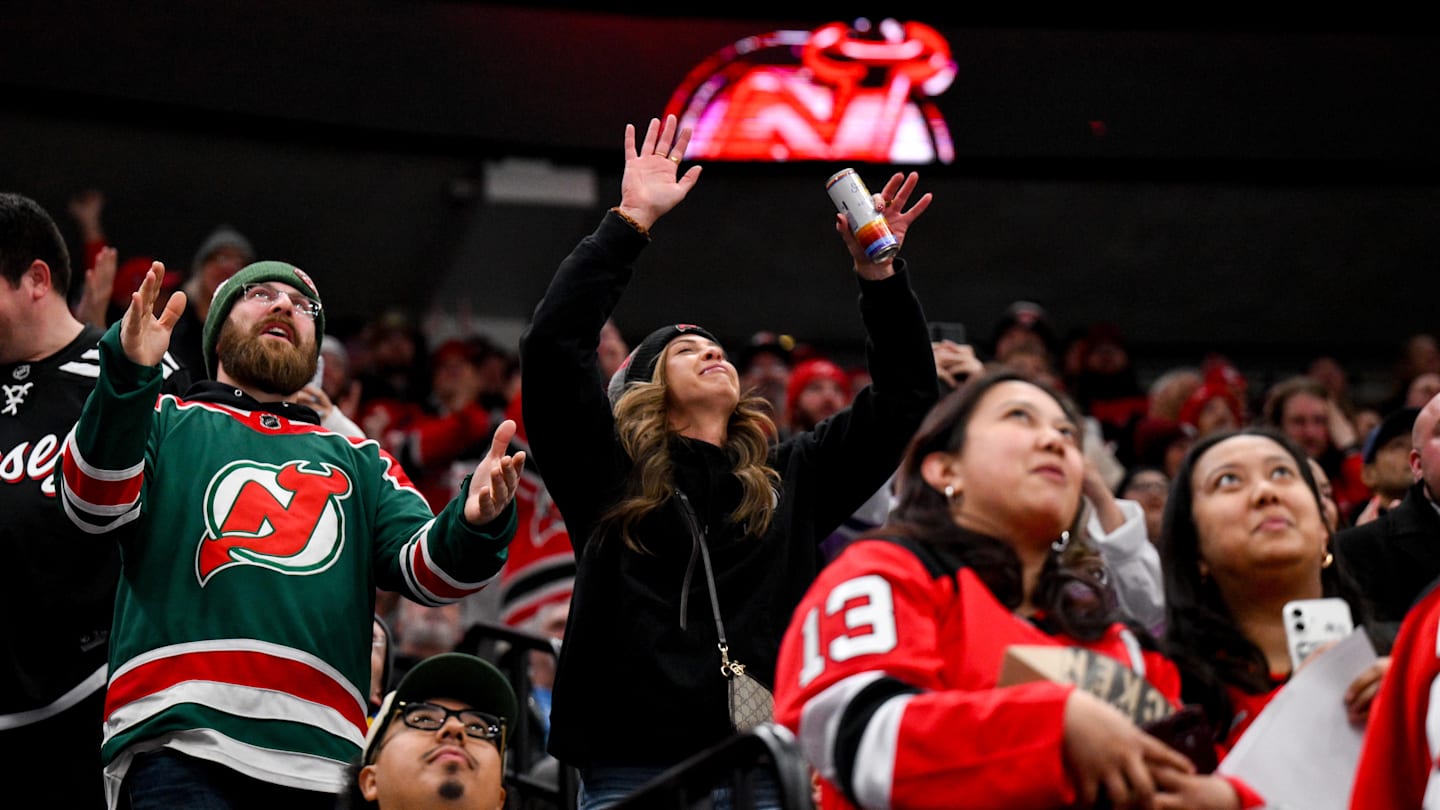 Fans react after a goal scored by New Jersey Devils defenseman Simon Nemec (not pictured) against the Philadelphia Flyers during the first period at Prudential Center. Mandatory Credit: John Jones-Imagn Images