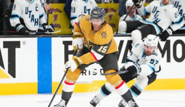 Apr 19, 2026; Las Vegas, Nevada, USA; Vegas Golden Knights defenseman Noah Hanifin (15) skates the puck away from Utah Mammoth left wing Michael Carcone (53) during the second period of game one of the first round of the 2026 Stanley Cup Playoffs at T-Mobile Arena. Mandatory Credit: Stephen R. Sylvanie-Imagn Images