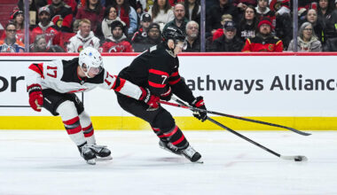 Jan 31, 2026; Ottawa, Ontario, CAN; Ottawa Senators left wing Brady Tkachuk  (7) plays the puck against New Jersey Devils defenseman Simon Nemec  (17) during the third period at Canadian Tire Centre. Mandatory Credit: David Kirouac-Imagn Images