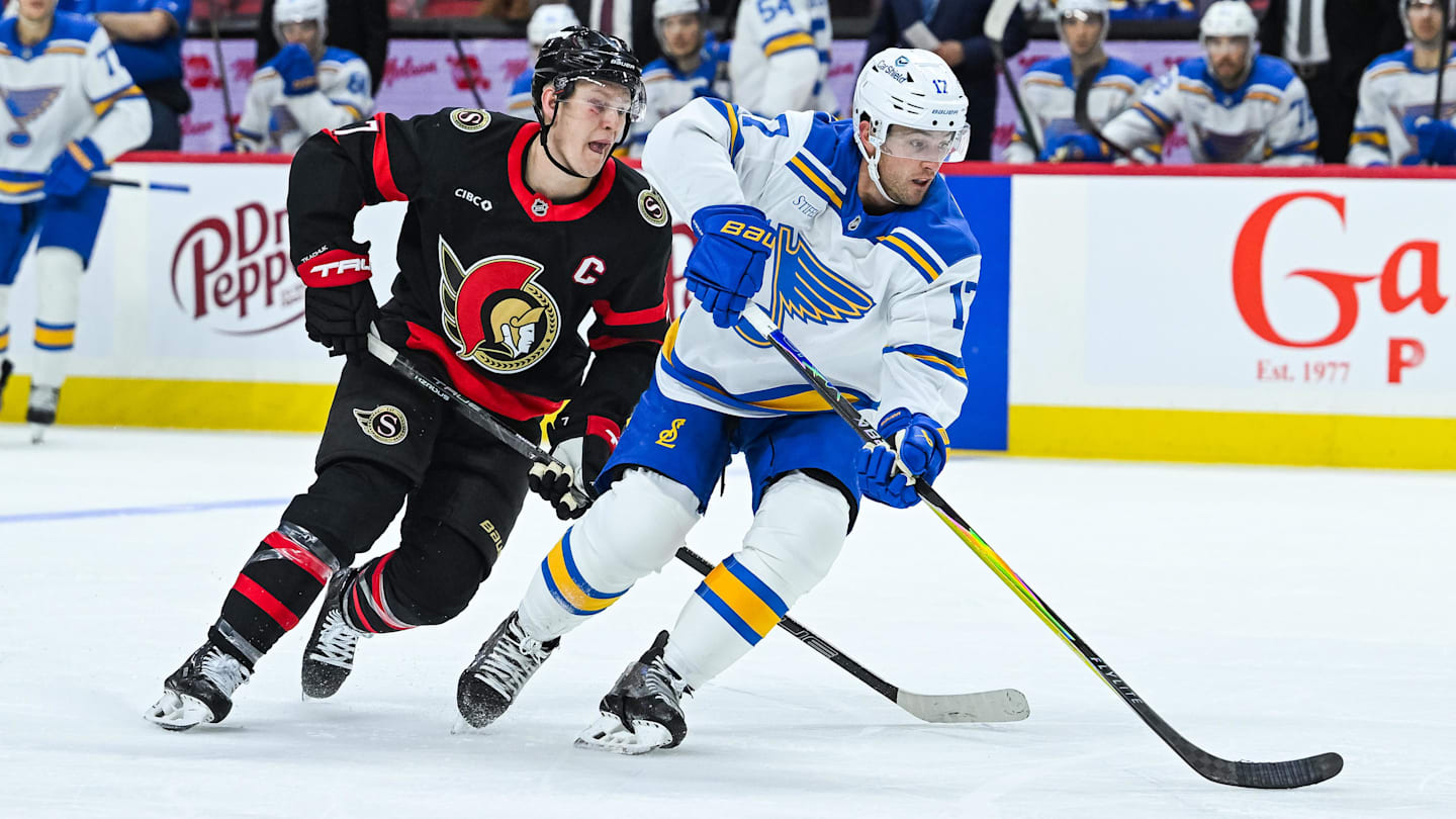 Dec 6, 2025; Ottawa, Ontario, CAN; St. Louis Blues defenseman Cam Fowler (17) defends against Ottawa Senators left wing Brady Tkachuk (7) during the third period at Canadian Tire Centre. Mandatory Credit: David Kirouac-Imagn Images