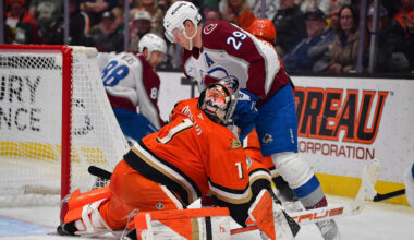 Mar 3, 2026; Anaheim, California, USA; Colorado Avalanche center Nathan MacKinnon (29) collides with Anaheim Ducks goaltender Lukas Dostal (1) during the third period at Honda Center. Mandatory Credit: Gary A. Vasquez-Imagn Images
