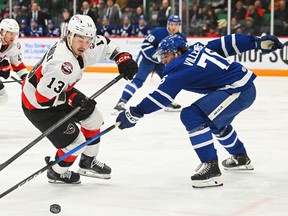 Belleville Senators Xavier Bourgault tries to power past Toronto Marlies William Villeneuve during a game earlier this season.
