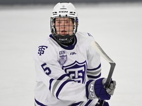 St. Thomas defenceman Hayes Hundley skates to the puck during a NCAA game against Lake Superior State earlier this season.