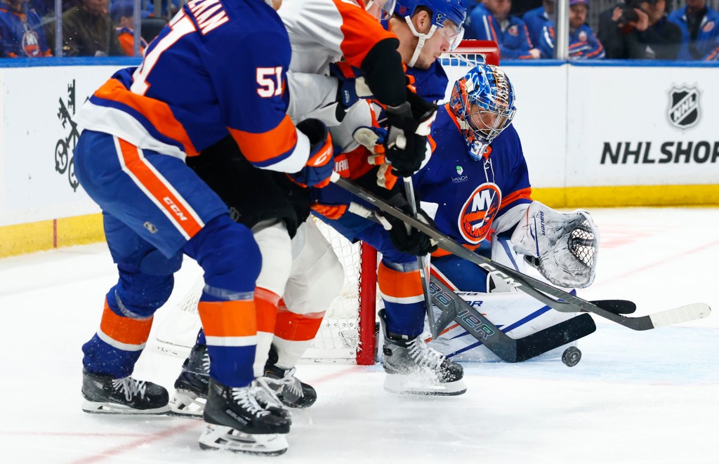 New York Islanders goaltender Ilya Sorokin (30) makes a save against the Philadelphia Flyers during the second period of an NHL hockey game, Friday, April 3, 2026 in Elmont, N.Y. 
