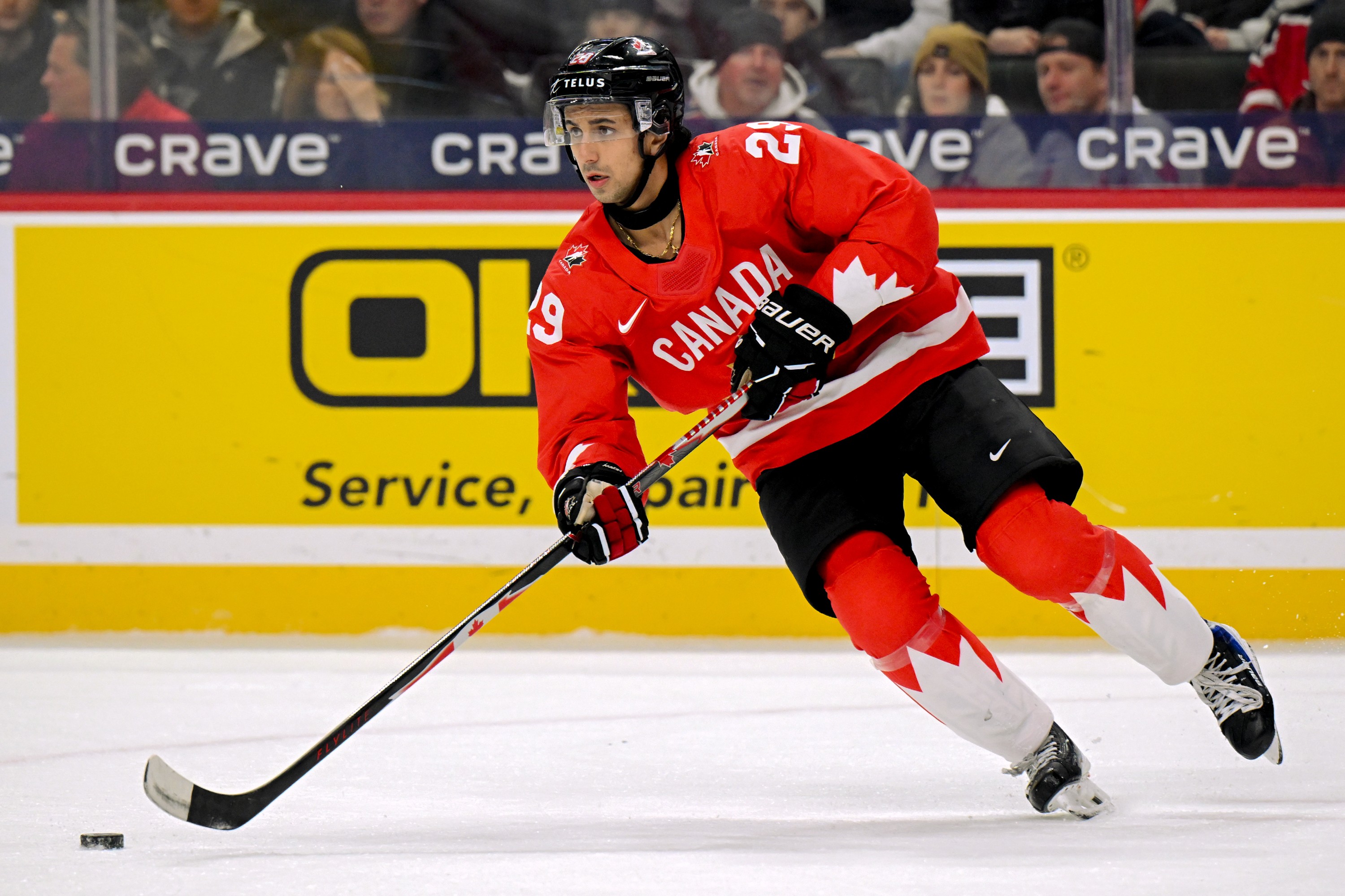Team Canada's Michael Hage controls the puck against Czechia in the first period of a semifinal game during the IIHF World Junior Hockey Championship on Jan. 4, 2026, in St. Paul, Minn.