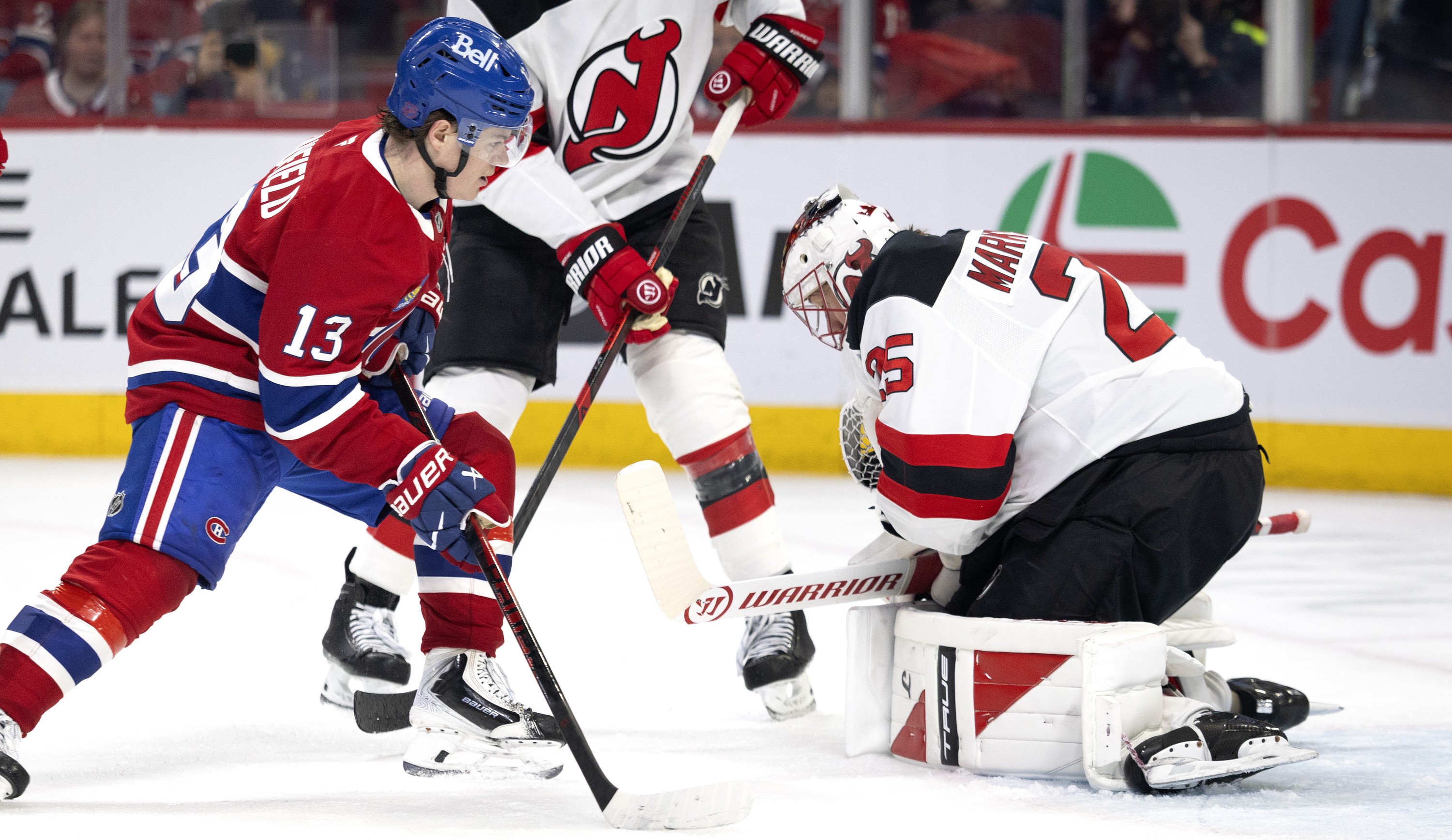 Montreal Canadiens right wing Cole Caufield looks for a rebound that does not come off New Jersey Devils goaltender Jacob Markstrom.