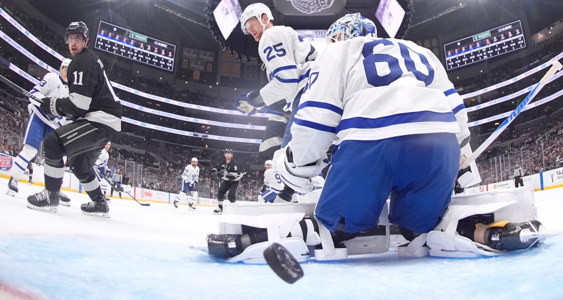 A shot from the net camera showing Maple Leafs goaltender Joseph Woll giving up a goal.