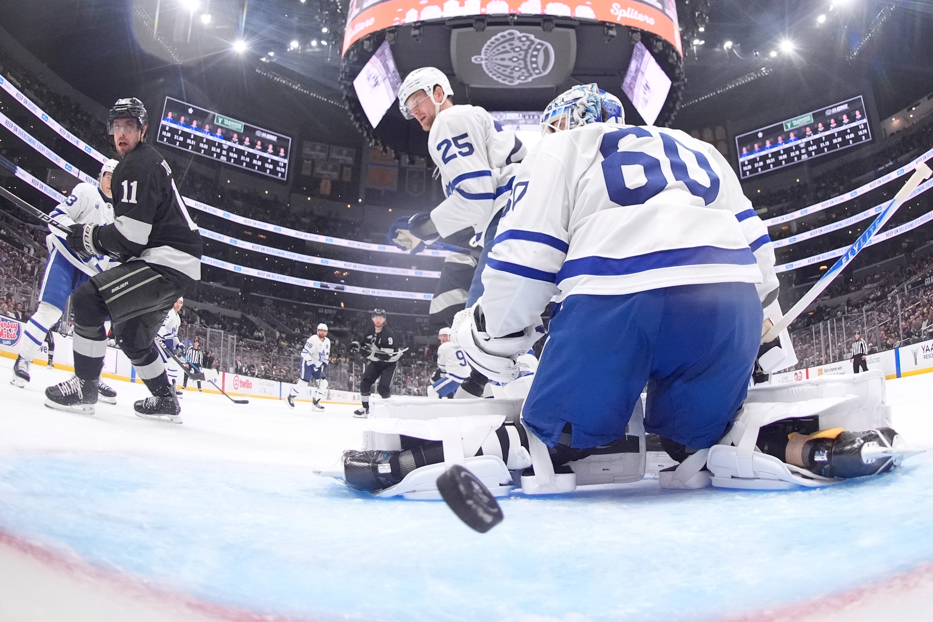 A shot from the net camera showing Maple Leafs goaltender Joseph Woll giving up a goal.