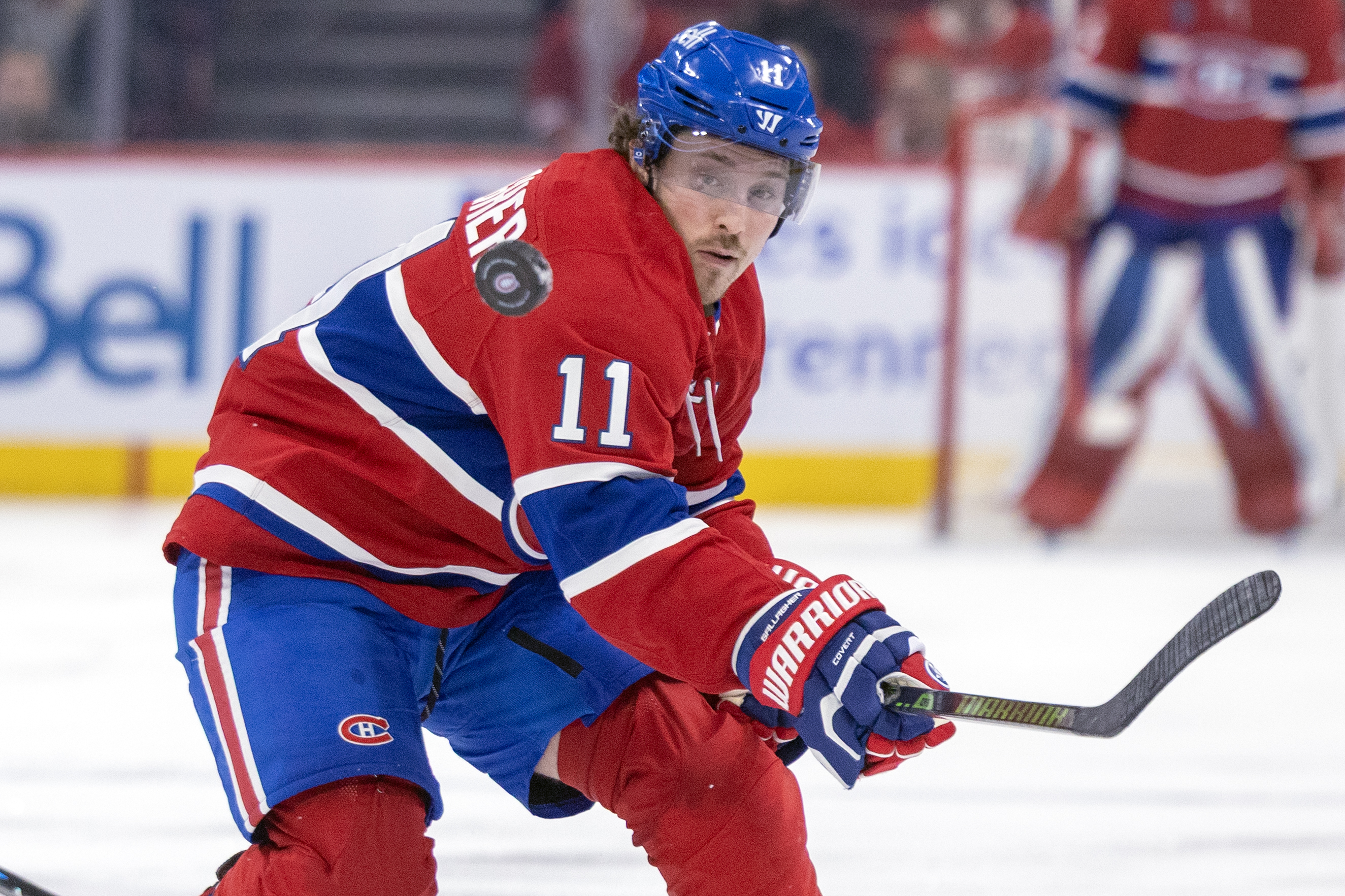 Cole Caufield is "the best goal-scorer in this locker room," says Canadiens Brendan Gallagher, backhanding the puck into the Columbus Blue Jackets' zone during third period in Montreal on March 26.