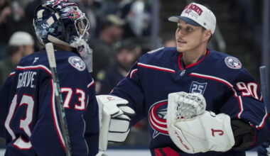 Nov 1, 2025; Columbus, Ohio, USA; Columbus Blue Jackets goaltender Jet Greaves (73) celebrates with goaltender Elvis Merzlikins (90) after defeating the St. Louis Blues at Nationwide Arena.