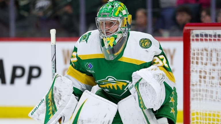 Minnesota Wild goaltender Filip Gustavsson defends his net against the...