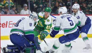 Wild wrap up a playoff spot with 5-2 victory over the Canucks